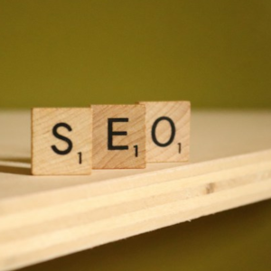 An image of wooden blocks spelling out SEO