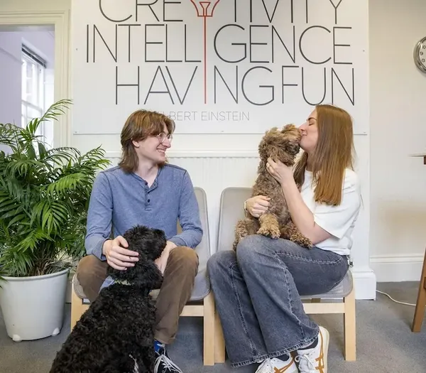 Two Zelst members with dogs, Henry and Pongo.