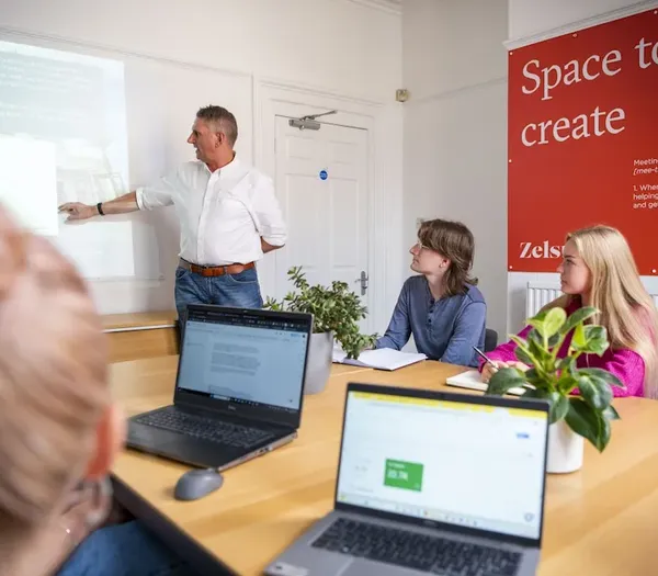 Peter showing the team SEO migration in the boardroom.