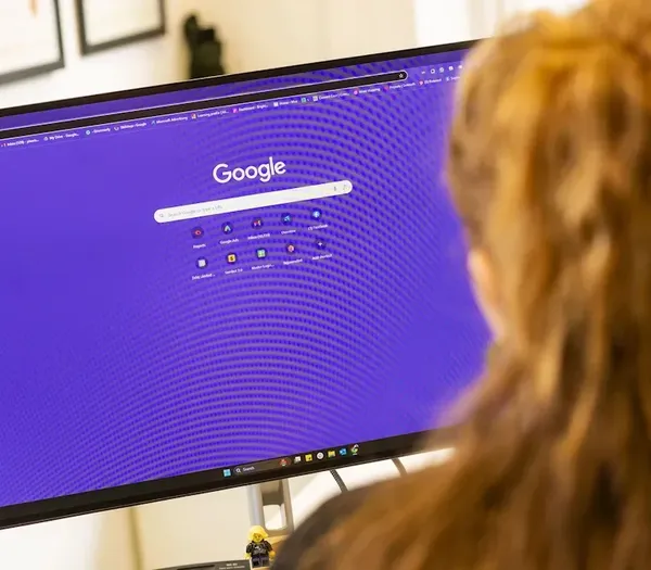 Zelst team member working on computer.