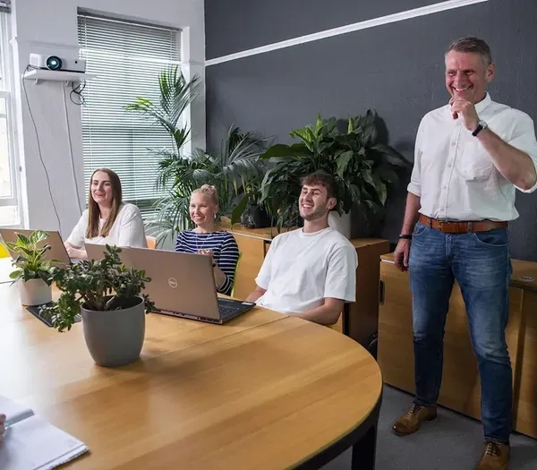 Zeslt team board room meeting.