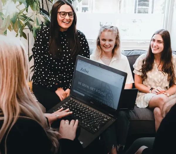 Zelst team members laughing.