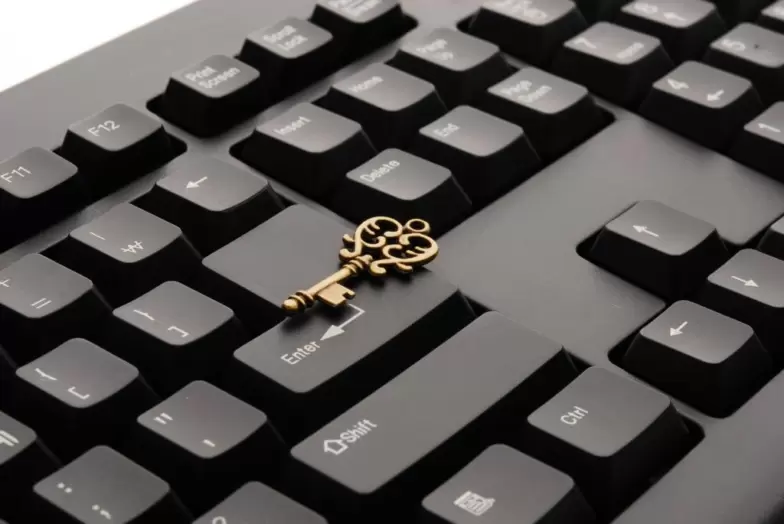 A small key on a computer keyboard.