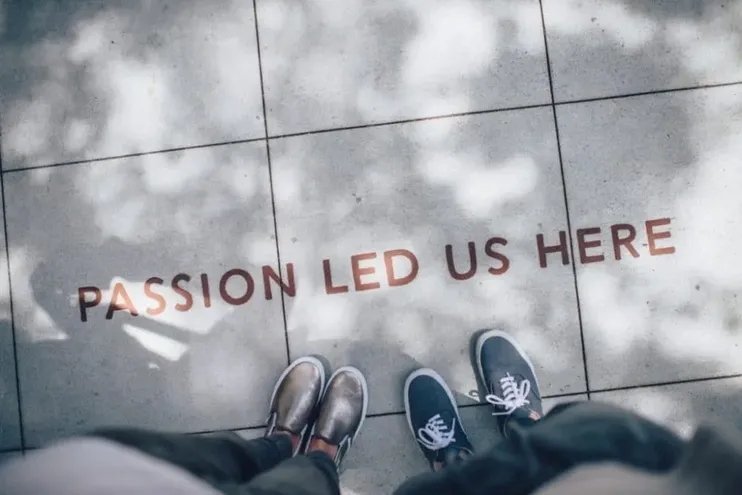 'Passion Led Us Here' wrote on the floor.
