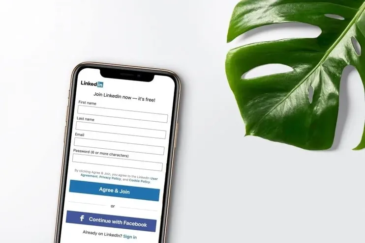 An iPhone displaying the log in screen for LinkedIn, one of the top PPC advertising platforms for recruitment.