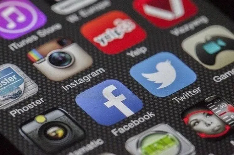 Social Media application icons on a smartphone.