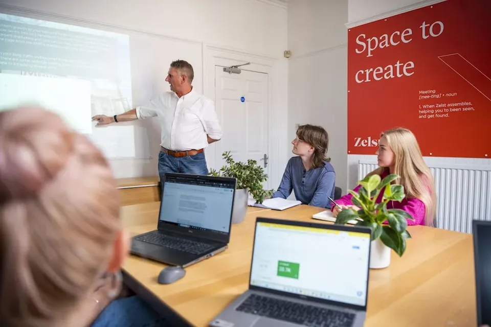 Peter showing the team SEO migration in the boardroom.
